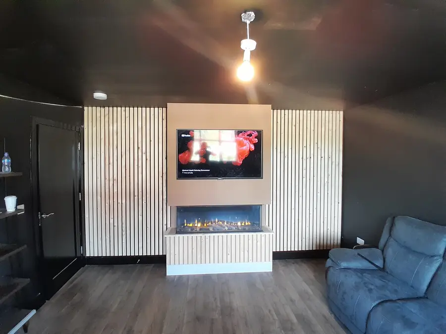 Slatted Media Wall — Dark Room